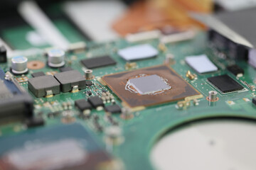 Detailed printed circuit board of broken modern laptop