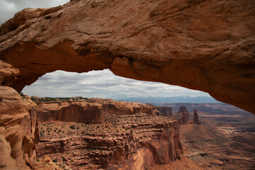 Naklejka na ściany i meble The Mesa Arch in Canyonlands National Park, Utah. A natural frame of the wild wild west.