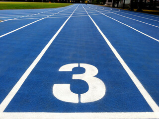 Stadium runway or athlete's track start number (3). Tracks are rubber man-made tracks used in athletics.