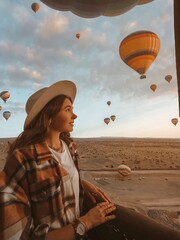 girl flying a hot air balloon