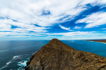 Landscapes with mountains, clouds and turquoise blue sea