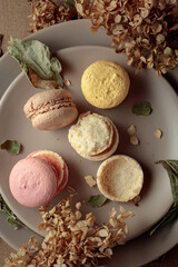 Macaroons with dried flowers.