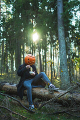 person with pumpkin