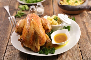 Roasted chicken with mashed potato and sauce