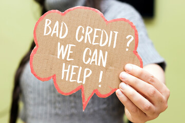 closeup woman holding chat discussion with bad credit ? we can help ! concept 