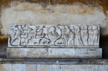 Pisa, Italy 04.27.2018: The Camposanto Monumentale, the ancient cemetery and mausoleum in the Square of Miracles in the Tuscan city of Pisa