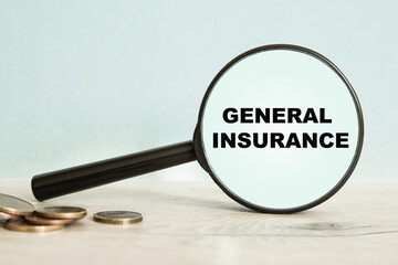 the text general insurance. Business concept. Workplace close up