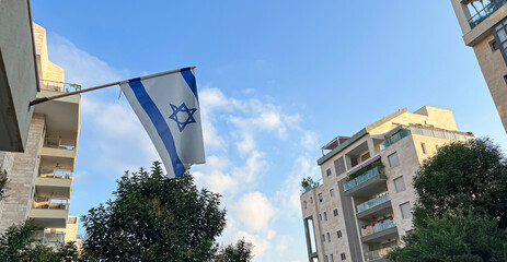 Flag of Israel on city street
