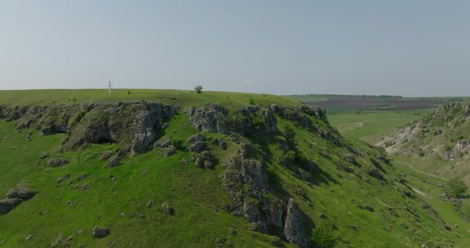 aerial view of Majestic Trinca Gorge Canyon from Above with two crows flying frome cross on the top of hill