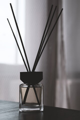 A bottle of fragrance for the home. Stylish interior
