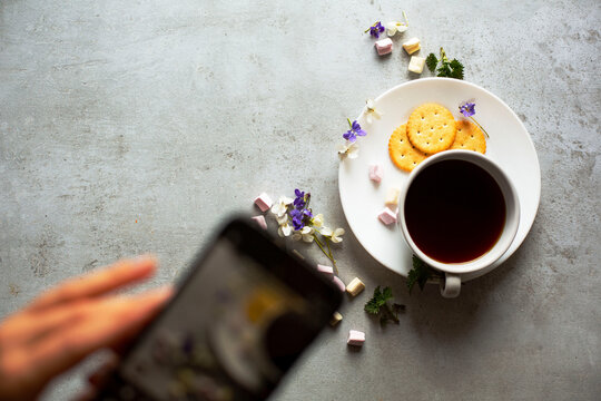 Morning tea with biscuits, served with fresh flowers