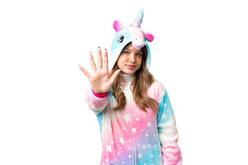 Young girl with unicorn pajamas over isolated chroma key background counting five with fingers