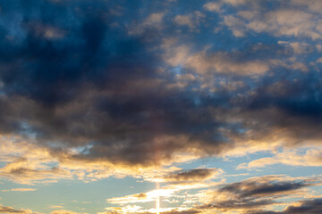 Dramatic sky with grey clouds over the city before the storm. Weather before or after a storm.