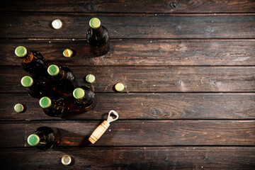 Bottles with beer and opener.