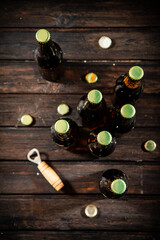 Bottles with beer and opener.