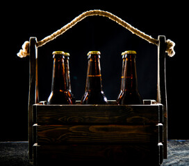 Old box with beer bottles.