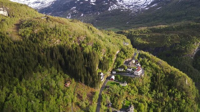 Drone view over the picturesque landscape of Geiranger fjord, Norway - slow motion