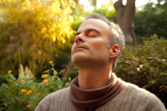 Medium shot portrait photography of a man in his 50s practicing mindfulness sophrology relaxation & stress-reduction wearing a cozy sweater against a garden or botanical background