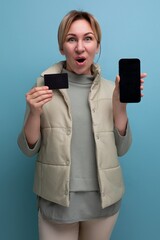 young 30s woman bought a smartphone with a plastic card