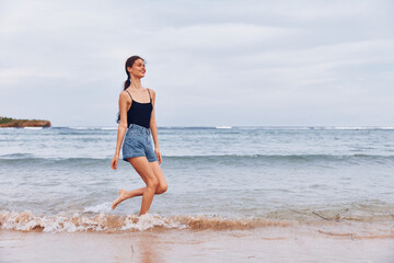 woman young running travel beach summer lifestyle sunset freedom sea smile