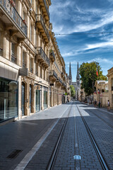 Street With View To Cathedral Saint Andre In The City Of Bordeaux In France