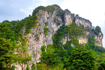 Nature mountains tropical jungle limestone cliffs Ao Nang Krabi Thailand.