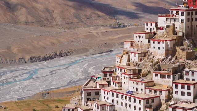 Closeup shot of Key Monastery in front of the Spiti River near Kaza in Spiti valley, Himachal Pradesh, India. Old buddhist monastery in front of the river spiti in India. Buddhist monastery in Spiti.