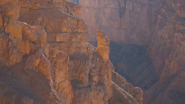 Closeup shot of rock on the side of a mountain canyon near Hikkim Village in Spiti Valley, Himachal Pradesh, India. Rocky formations of the Himalayan mountain in Spiti. Natural canyon background.