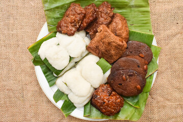 Jadah Tempe, traditional food from Jogja, Indonesia. Jadah tempe is made from savory sticky rice and fried bacem tempe.