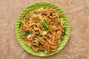 Mie Goreng Jawa or Bakmi Jawa or Java Noodle. Indonesian traditional street food noodles from central java or Yogyakarta, indonesia.