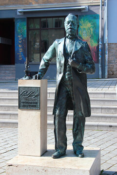 Jena, Germany - May 26, 2023: Sculpture of physicist, optical scientist and inventor Carl Zeiss in the center of Jena, Thuringia, where he lived and worked.