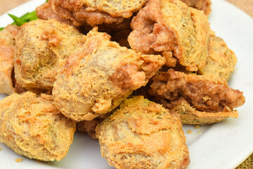 Tahu Walik (inside out tofu) is a processed tofu snack fried in starch and other ingredients. This snack origin from the Banyuwangi region, East Java, Indonesia.