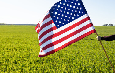 American flag on green grass background. independence day concept. patriotic holiday USA, Pride to be an American. freedom, national consciousness. Travel around the country