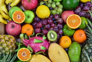 assorted fruits, top view healthy food concept Including high vitamin fruits, fresh fruits, thai fruits