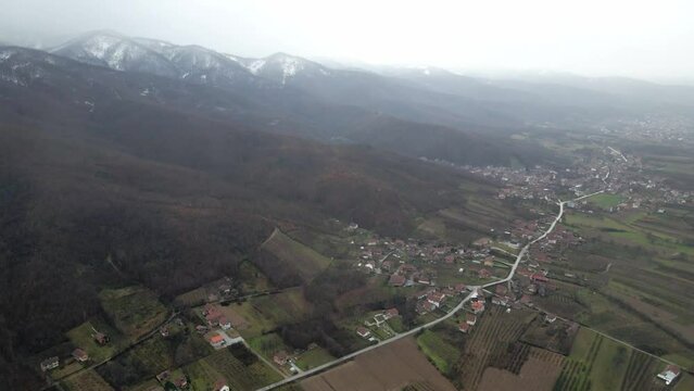 Aerial landscape footage of Leskovac, city in south Serbia, winter time.