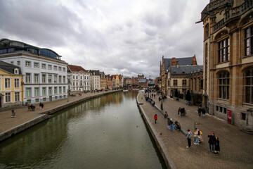 Obraz premium View of Graslei pier and Leie river in the historic city center of Ghent (Gent), Belgium. Ghent architecture and landmark. Ghent City Landscape.