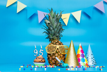 Creative background with pineapple character in sunglasses copy space. Happy birthday background...