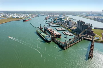 Deurstickers Aerial from industry in the Rotterdam harbor in the Netherlands © Nataraj