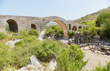 Fototapeta na wymiar The historic Ottoman-era Mesi bridge outside of Shkoder, Albania