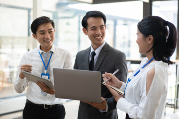 business people in the office while working on a company project with laptop computer.