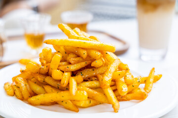 French fries with cheese in restaurant