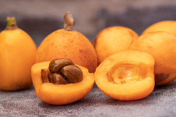 Close up view of loquat fruit isolated on table