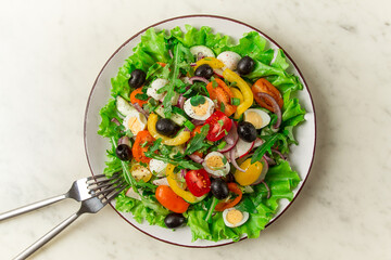 Vegetable salad , with quail eggs and olives, fresh, close-up, no people,