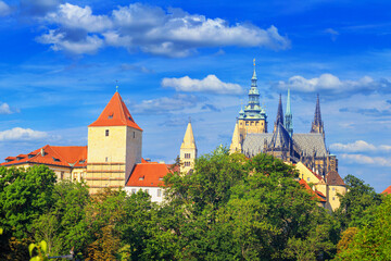 Fototapeta na wymiar Summer cityscape - view of the Hradcany historical district and castle complex Prague Castle, Czech Republic