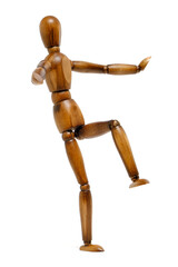 Wooden brown mannequin in motion.