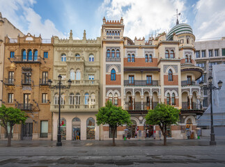 Fototapeta na wymiar Edificio La Adriatica at Avenida de la Constitucion Street - Seville, Andalusia, Spain