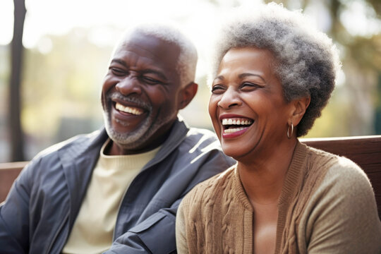 Happy Black senior couple relaxing outdoors at park together laughing. Generative AI..