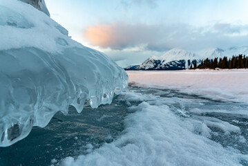 Ice mushroom formations seen in winter season time with snow capped mountains in distant...