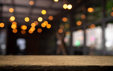 Empty wooden table and blurred cafe background, product display