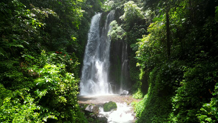 Labuhan Kebo waterfall. Labuhan Kebo waterfall is a beautiful multi tier stream situated in a lush green valley.	
